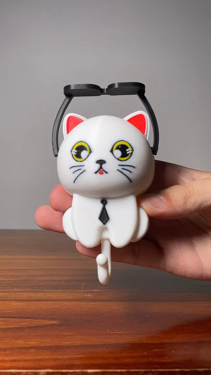 Colgador gato con anteojos
