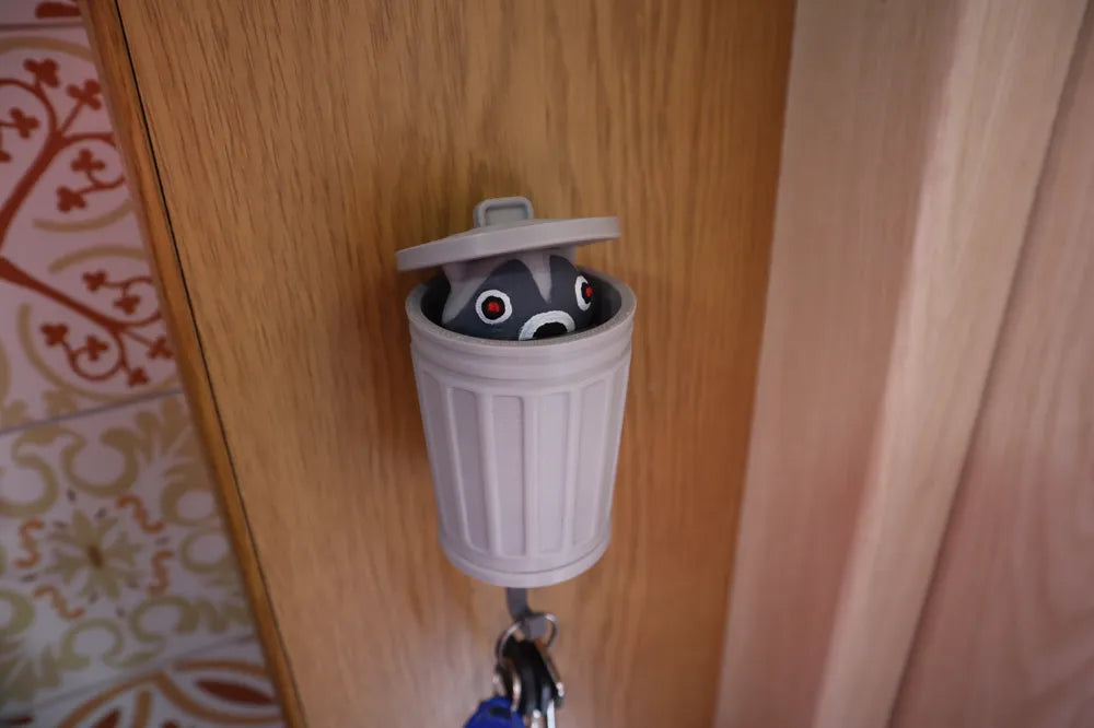 Colgador De Mapache Emergente