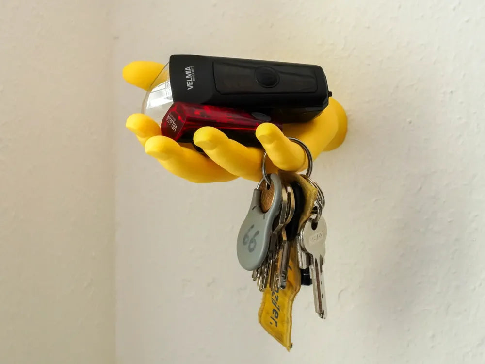 Soporte colgador con forma de mano